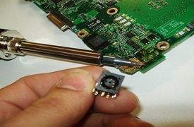 Reparar conector corriente portátil